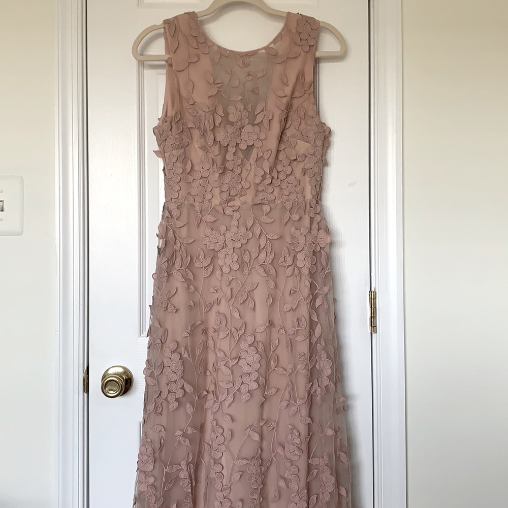 Size 2, BCBG Maxzaria maxi dress with floral appliqués on tulle. Worn once.